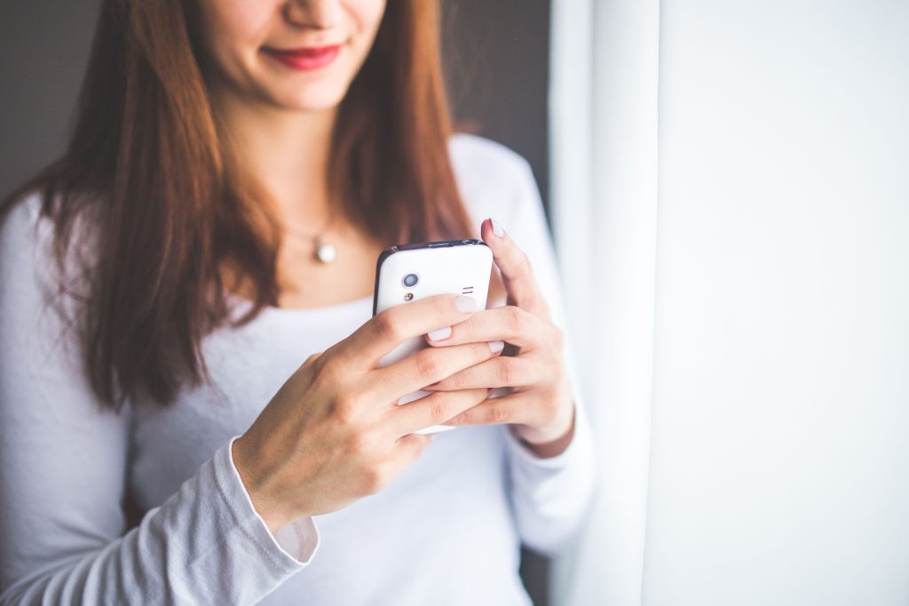 girl is chatting on online dating app